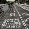 Chinese city with separate sidewalks for mobile phone addicts